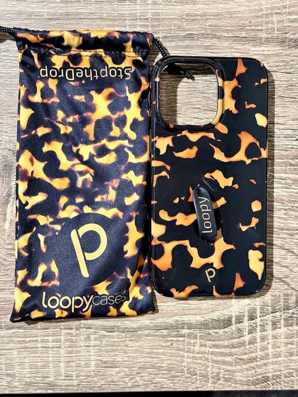 loopy Phone Case in Brown & Black Like New
